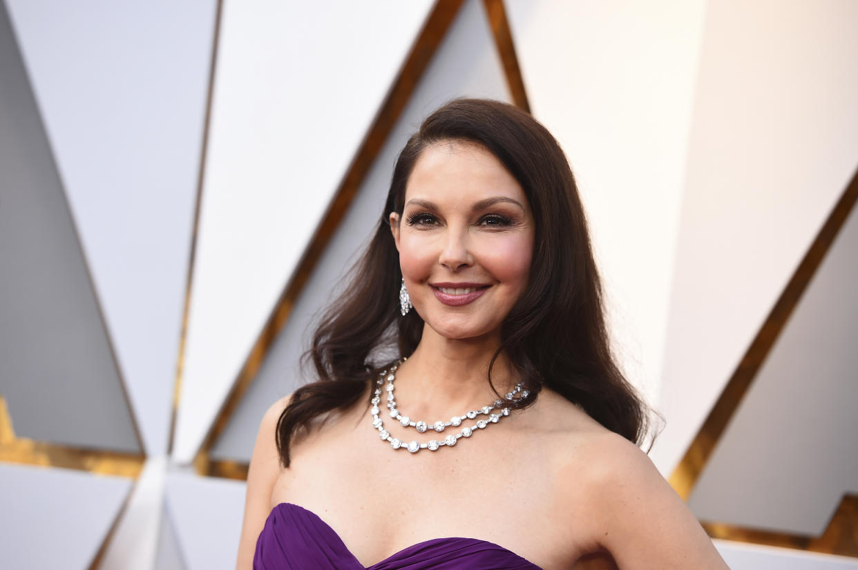 FILE - In this March 4, 2018, file photo, Ashley Judd arrives at the Oscars at the Dolby Theatre in Los Angeles. Harvey Weinstein's lawyers say Judd's allegations that he tried to hurt her career after she rejected him sexually are baseless, and they have asked a judge to dismiss her lawsuit against him. The court documents filed Wednesday, July 18, discuss Judd's comment that she would only let Weinstein touch her after she won an Academy Award in one of his films. (Photo by Jordan Strauss/Invision/AP, File)