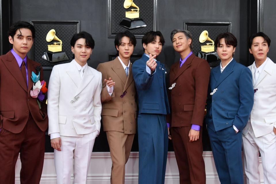 South Korean boy band BTS arrives for the 64th Annual Grammy Awards at the MGM Grand Garden Arena in Las Vegas on 3 April 2022 (AFP via Getty)