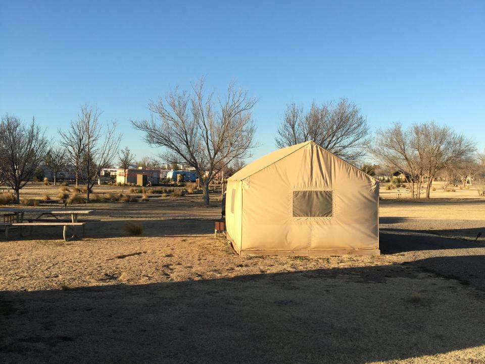 A white tent on the El Comisco campgrounds.