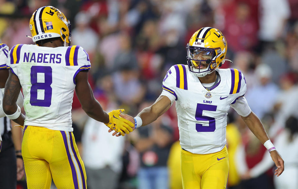 Jayden Daniels and Malik Nabers, teammates at LSU, were both first-round picks in the NFL Draft on Thursday night. (Photo by Kevin C. Cox/Getty Images)