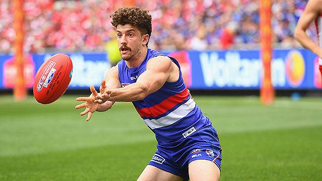 Tom Liberatore of the Bulldogs habdballs during the 2016 AFL Grand Final. Pic: Getty