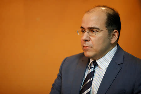 Venezuelan economist Francisco Rodriguez, economic advisor of the Venezuelan presidential candidate Henri Falcon, pauses during an interview with Reuters in Caracas, Venezuela March 12, 2018. Picture taken March 12, 2018. REUTERS/Carlos Garcia Rawlins