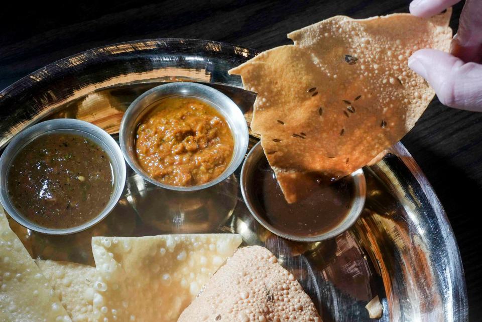 The Cheel's aachar are pickled dipping sauces meant to enhance any dish on the menu. Pictured are the Classic, Tangy Tamarind and Aago.