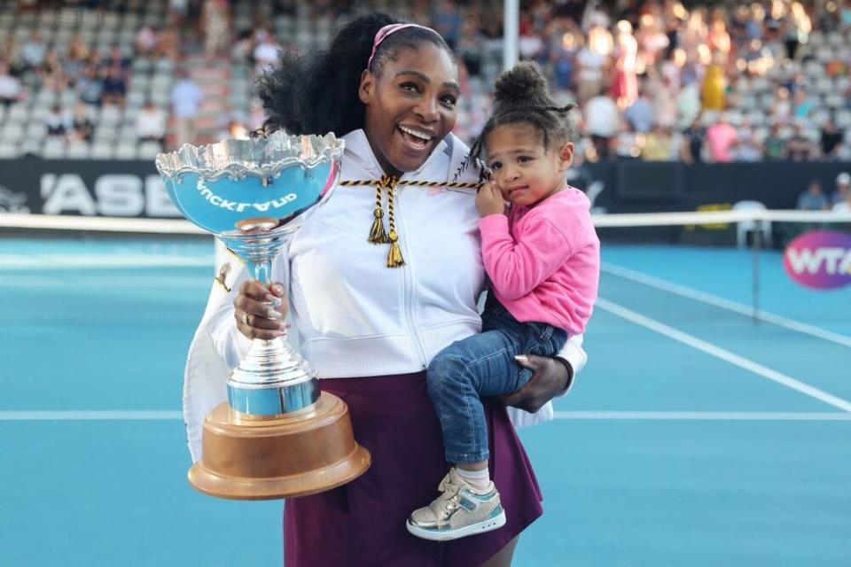 Serena Williams with her daughter after winning the  Auckland Classic tennis tournament in January | MICHAEL BRADLEY/AFP via Getty Images