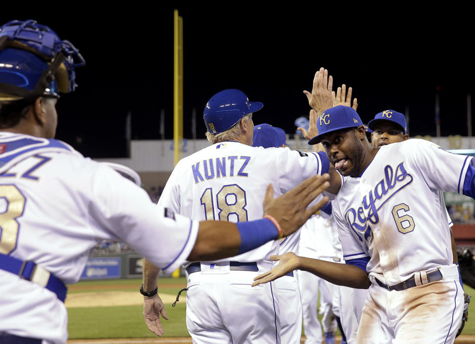 <p>Kansas City Royals’ Salvador Perez, left, and Lorenzo Cain (6) celebrate after the team’s baseball game against the Baltimore Orioles on May 12, 2017, in Kansas City, Mo. The Royals won 3-2. (Photo: Charlie Riedel/AP) </p>