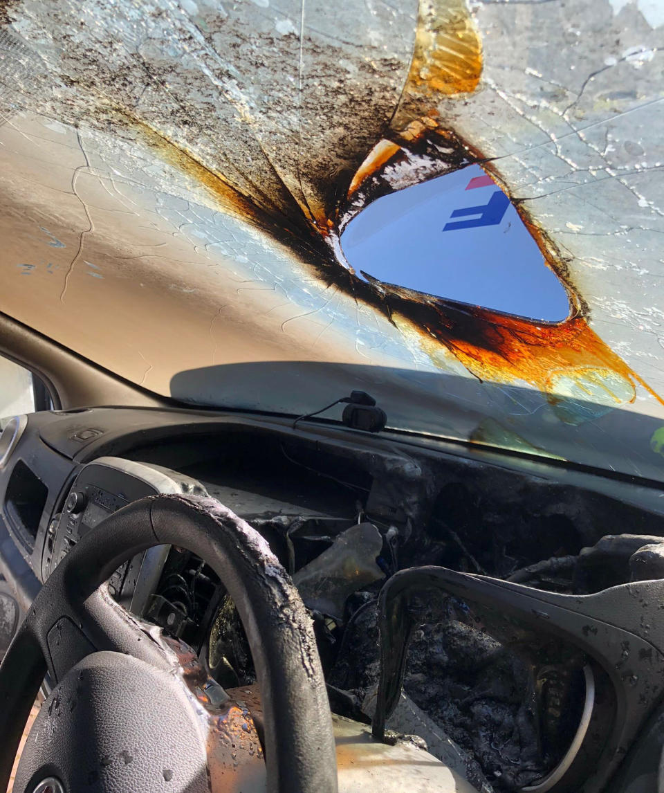 Shocking photo shows how a pair of sunglasses left on a car's dashboard caused a huge blaze that ripped through the vehicle.The reflective shades, which ignited the fire by magnifying a concentrated ray from the sun, melted the car’s plastic interior and parts of its engine bay.See SWNS story SWMRglasses.The burn broke out at 5.05pm in the village of Nuthall, Nottinghamshire, on Saturday (May 27) and was only doused after a fire engine attended the scene.Nottingham Fire and Rescue Service, who shared the image, warned motorists not to leave anything shiny in their vehicles that might also ignite a blaze.
