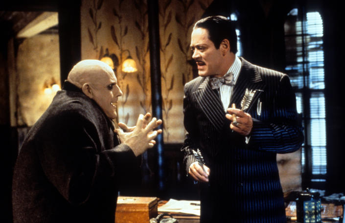 Christopher Lloyd and Raul Julia talking in a scene from the film &#39;Addams Family Values&#39;, 1993. (Photo by Paramount/Getty Images)