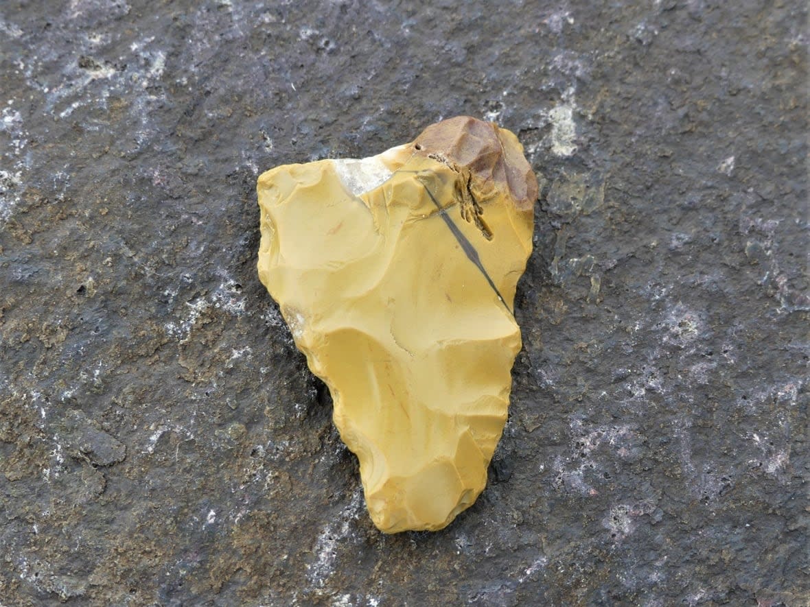 A flake stone tool was found on Inch Arran beach in Dalhousie by a Dalhousie woman who believed it was a spear point. The rock hasn't been authenticated, but experts say it could be thousands of years old. (Submitted by Pauline Carrier - image credit)