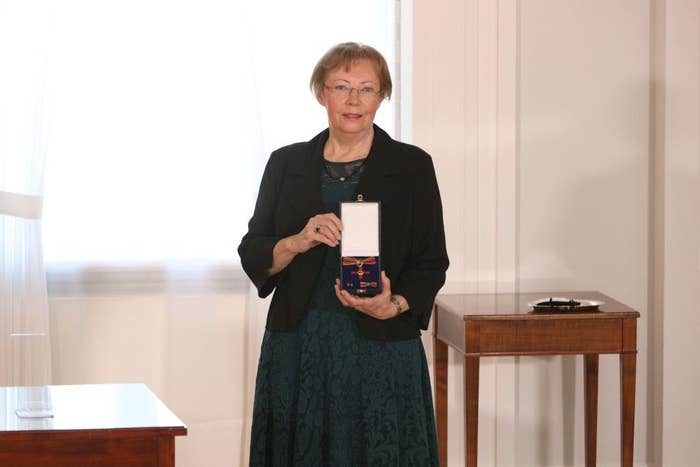 Dr. Diller accepts an award for ecological conservation