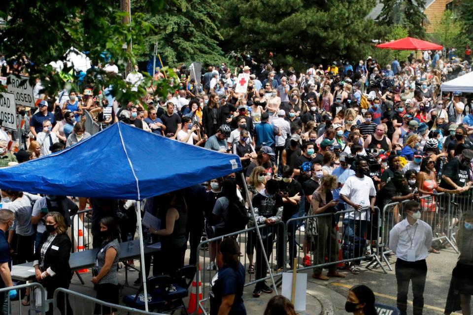 Crowds gather outside the memorial (AP)