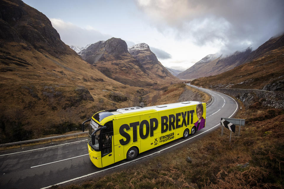 The SNP campaign bus travels up the Pass of Glencoe in the Highlands during its tour of Scotland in the final week of the General Election campaign.