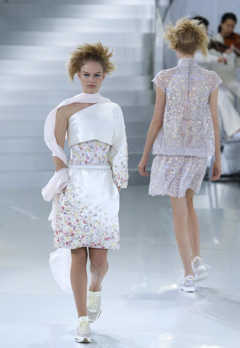 A model wears a creation during Chanel's Spring-Summer 2014 Haute Couture fashion collection presented in Paris, Tuesday, Jan.21, 2014. (AP Photo/Jacques Brinon)