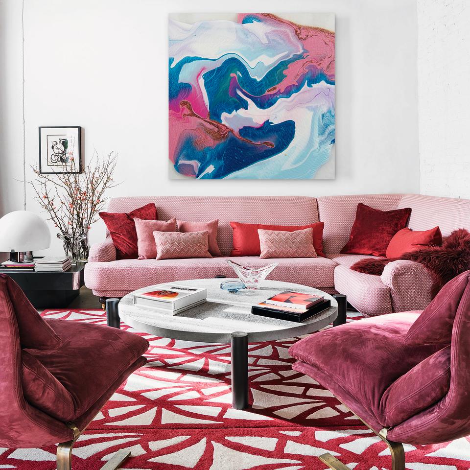 Living room with red and white abstract rug