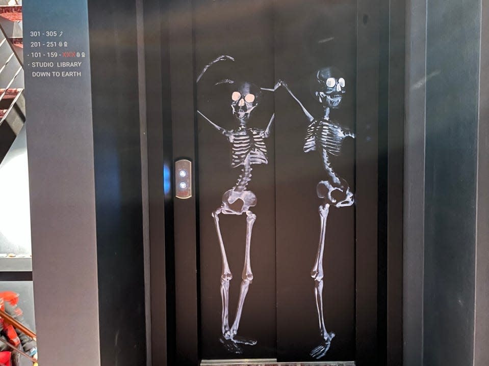 Elevator doors with skeletons on them