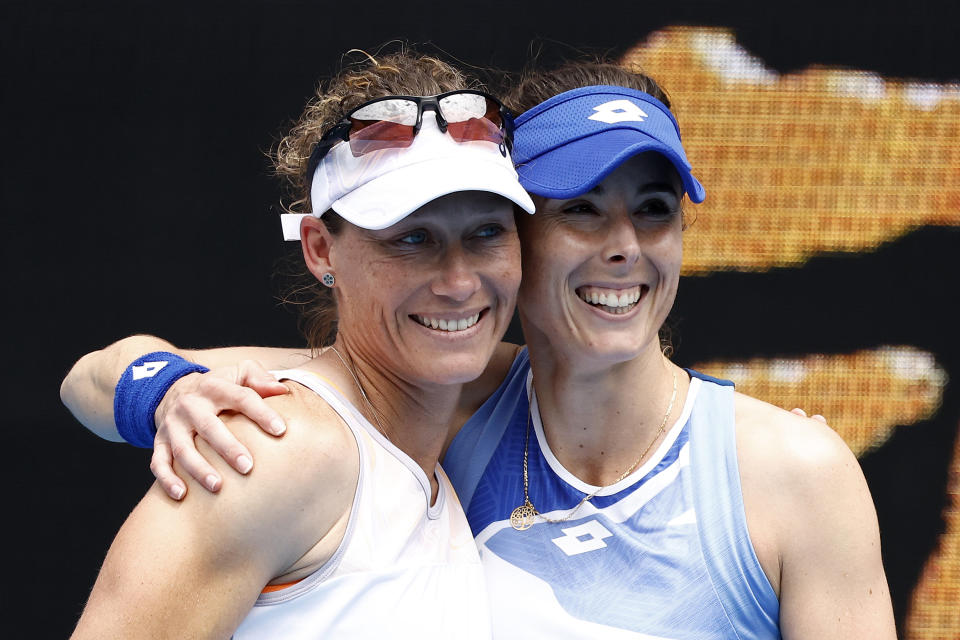 Sam Stosur, pictured here embracing Alize Cornet after their loss at the Australian Open.