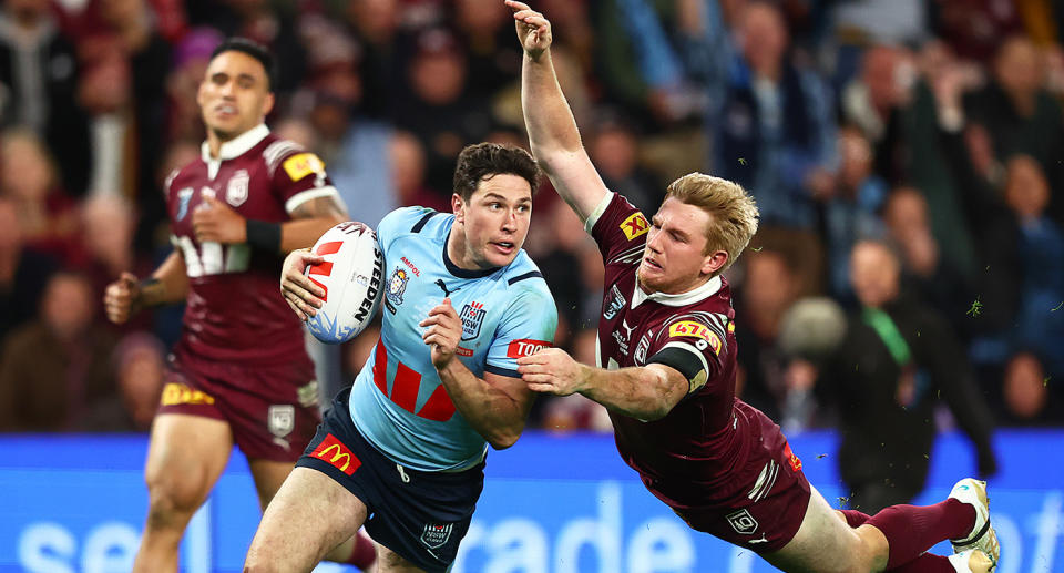 Seen here, Mitchell Moses crosses for the game-clinching try for NSW in the State of Origin Game 3 decider against Queensland. 