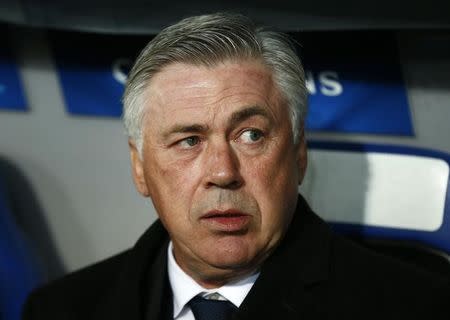 Real Madrid's coach Carlo Ancelotti looks on before their Champions League Group B soccer match against FC Basel at St. Jakob-Park stadium in Basel November 26, 2014. REUTERS/Arnd Wiegmann