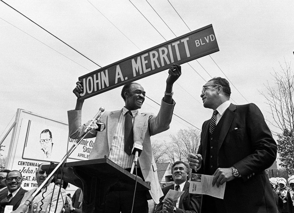 Tennessee State coach John Merritt, right, receives a souvenir street sign from Metro Councilman Willis McCallister, who helped sponsor the measure to the renaming the street for Merritt. The long-time coach was honor during a newly named street dedication ceremony at the corner of Centennial Boulevard and 28th Avenue April 24, 1982.