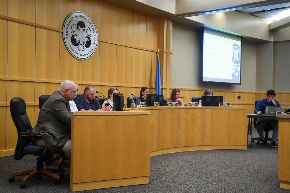 Sioux Falls school board members and administrators listen to a presentation during a meeting on Monday, Aug. 14, 2023. From left to right: Todd Vik, Kate Serenbetz, Marc Murren, Carly Reiter, Dawn Marie Johnson, Nan Baker, Jane Stavem and Brett Arenz.