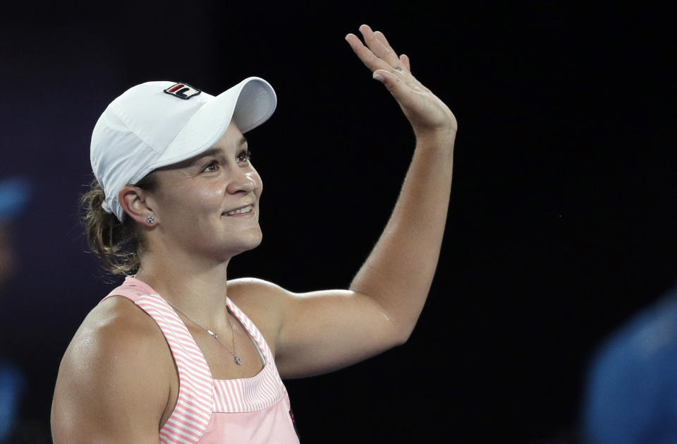 Australia's Ashleigh Barty celebrates after defeating Greece's Maria Sakkari during their third round match at the Australian Open tennis championships in Melbourne, Australia, Friday, Jan. 18, 2019. (AP Photo/Kin Cheung)