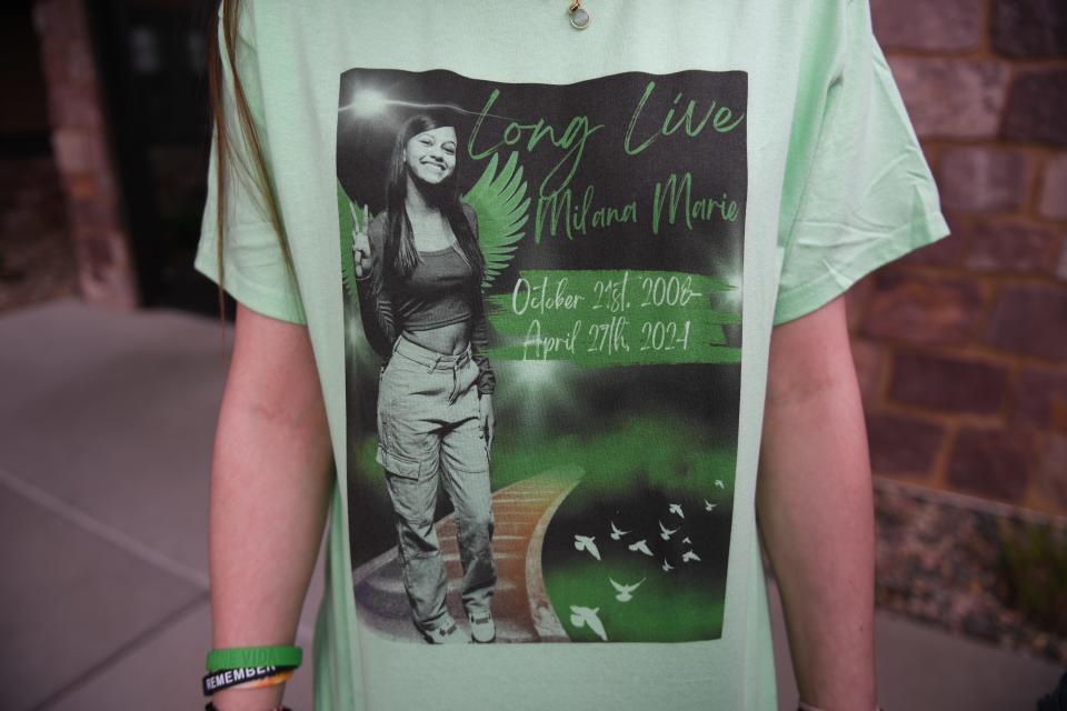 One of Milana Marie Reeves friends shows her shirt of Reeves on Friday, May 3, 2024, at George Boom Funeral Home & On-Site Crematory in Sioux Falls.