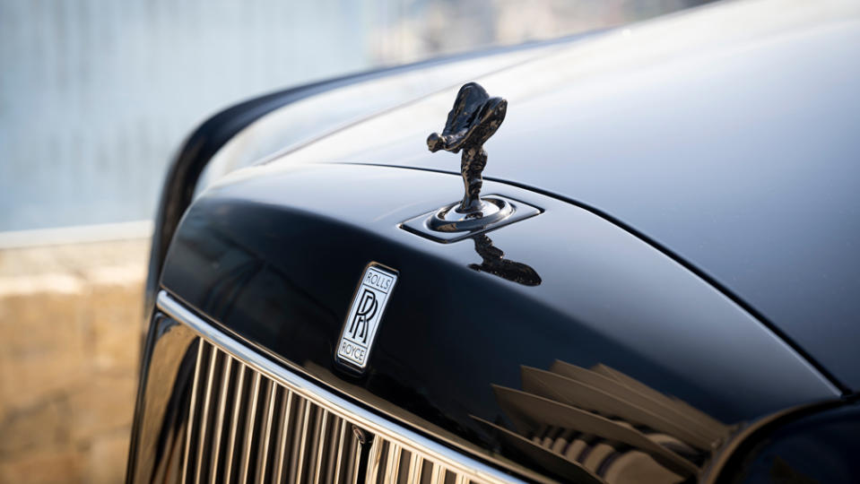The “RR” badge and Spirit of Ecstasy hood ornament feature more prominently on the latest Phantom. - Credit: James Lipman, courtesy of Rolls-Royce Motor Cars.