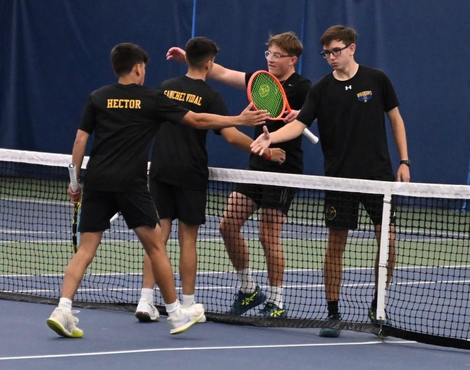 Ontario's two doubles teams congratulate each other after meeting for third place in Saturday's Division II sectional tennis tournament.