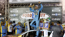 Driver Kyle Busch celebrates after winning a NASCAR Cup Series auto race, Sunday, April 17, 2022, in Bristol, Tenn. (AP Photo/Wade Payne)