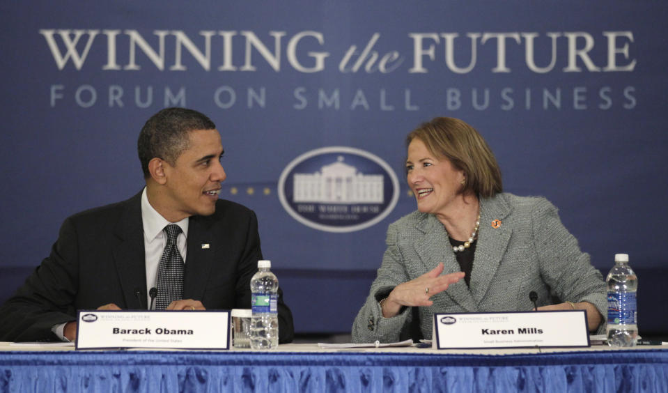 President Barack Obama and Small Business Administration (SBA) Administrator Karen Mills participate in a breakout session during the Winning the Future Forum on Small Business at Cleveland State University in Cleveland, Tuesday, Feb. 22, 2011.  (AP Photo/Carolyn Kaster)