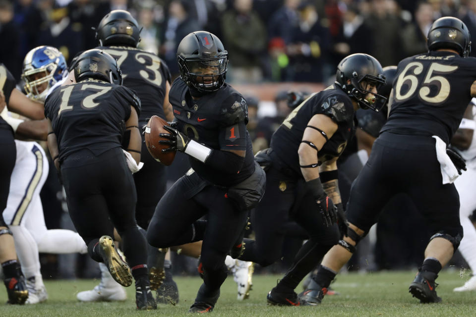 Army's Kelvin Hopkins Jr. drops back during the first half of an NCAA college football game against Navy, Saturday, Dec. 8, 2018, in Philadelphia. (AP Photo/Matt Slocum)