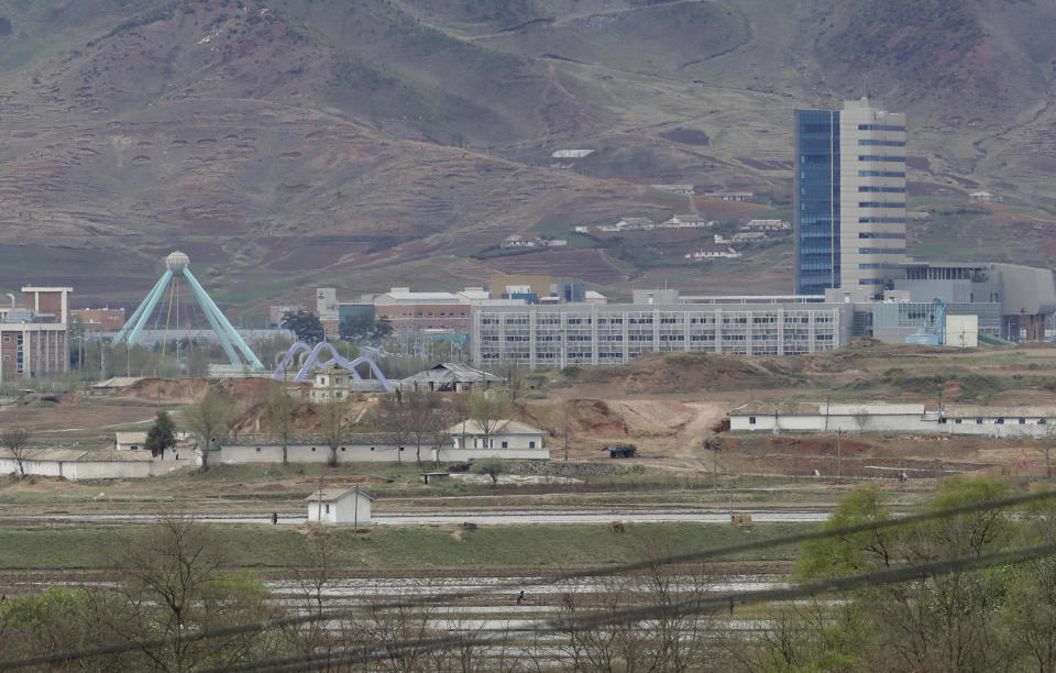 FILE - In this April 24, 2018, file photo, the Kaesong industrial complex in North Korea is seen from the Taesungdong freedom village inside the demilitarized zone during a press tour in Paju, South Korea. South Korea's Unification Ministry on Wednesday, Oct. 10, 2018, said the water is being supplied to a liaison office between the countries that opened in Kaesong in September 2018 and has been provided to the town's residents as well. (AP Photo/Lee Jin-man, File)