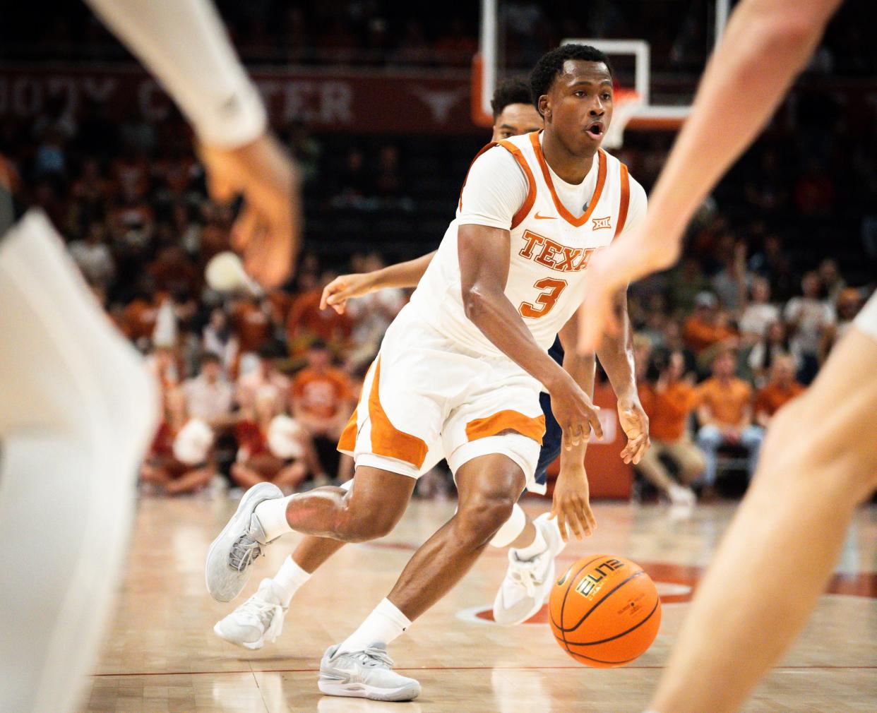 Texas guard Max Abmas brings the ball down the court in a win over Rice earlier this season. Abmas picked up his second Big 12 newcomer of the week honor Monday after a week that included a season-high 32 points in a loss to West Virginia on Saturday.