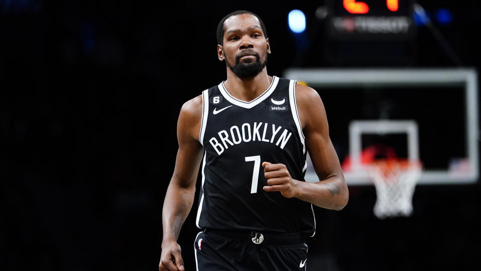 FILE - Brooklyn Nets' Kevin Durant (7) plays during the first half of an NBA basketball game against the Golden State Warriors Wednesday, Dec. 21, 2022 in New York. When the Brooklyn Nets traded Kyrie Irving and then Kevin Durant, the drama that had engulfed the team went with them — along with any realistic title hopes for this season. (AP Photo/Frank Franklin II, File)