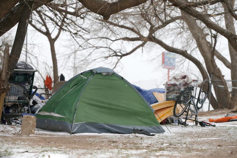 A tent near a homeless camp is seen west of downtown Oklahoma City during a winter storm, Thursday, Dec. 22, 2022. 