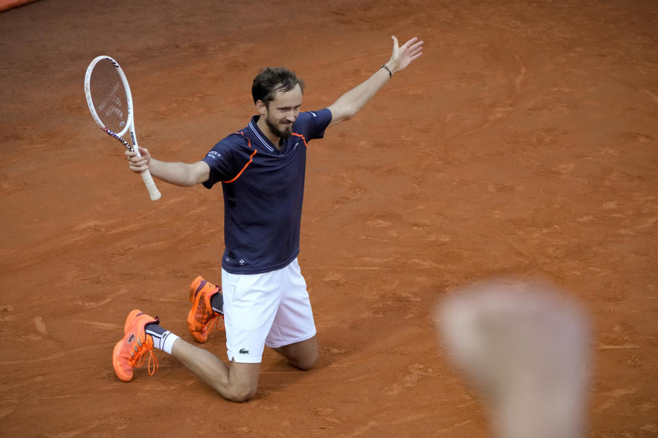 Daniil Medvedev of Russia celebrates defeating Denmark's Holger Rune during the men's final tennis match at the Italian Open tennis tournament in Rome, Italy, Sunday, May 21, 2023. (AP Photo/Gregorio Borgia)