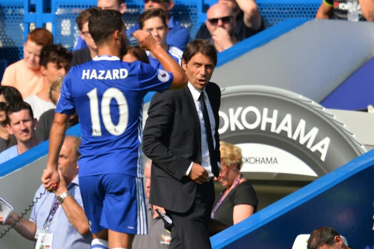 With new Chelsea head coach Antonio Conte (R) in charge and stability restored at Stamford Bridge, Eden Hazard has started the new season in sparkling form