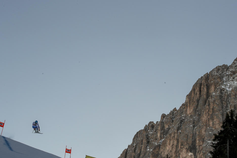 United States' Ryan Cochran Siegle speeds down the course during an alpine ski, men's World Cup downhill training, in Val Gardena, Italy, Thursday, Dec. 16, 2021. (AP Photo/Gabriele Facciotti)