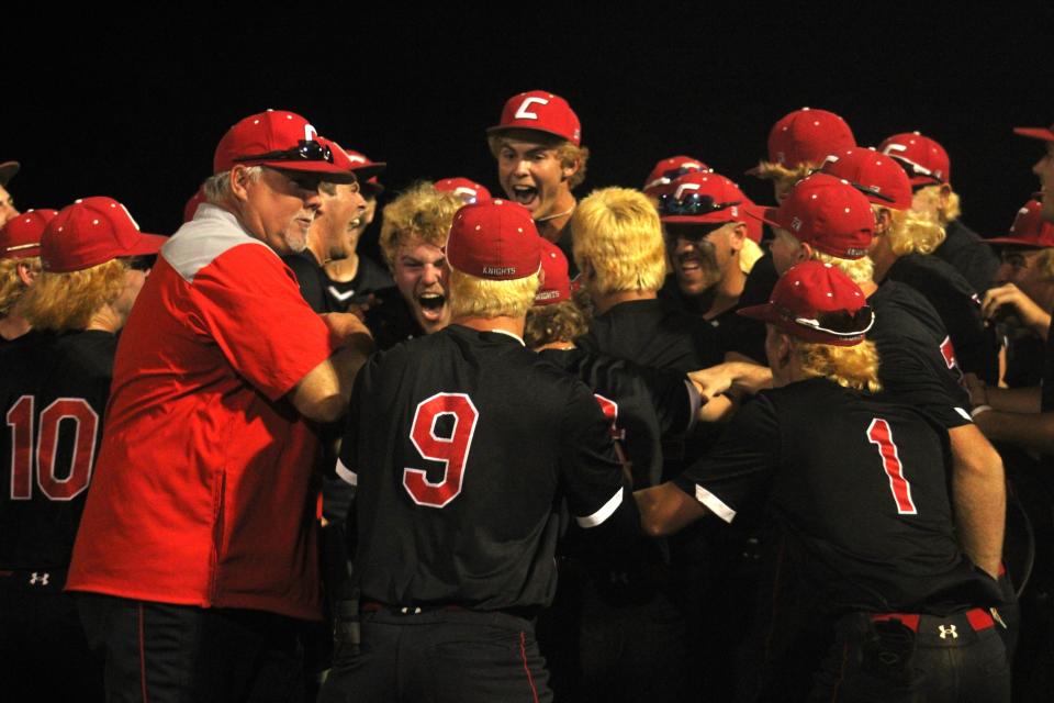 Creekside players and coaches celebrate their Region 1-7A high school baseball semifinal win against Lake Mary on May 10, 2024. [Clayton Freeman/Florida Times-Union]