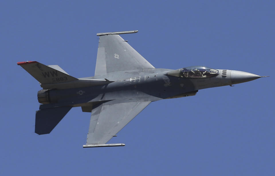 FILE - A U.S. fighter aircraft F-16 performs aerobatic maneuvers on the last day of Aero India 2019 at Yelahanka air base in Bangalore, India, Feb. 24, 2019. The chief of the National Guard said Thursday, Feb. 8, 2024, that the U.S. is still able to train Ukrainian pilots on F-16 fighter jets despite the U.S. running out of funds to send additional weapons and assistance to Kyiv. (AP Photo/Aijaz Rahi, File)