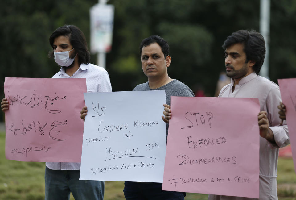 Pakistani journalists hold a demonstration to condemn the kidnaping of their colleague Matiullah Jan, in Islamabad, Pakistan, Tuesday, July 21, 2020. Jan, a prominent Pakistani journalist, known for his hard hitting criticism of the country's powerful institutions, including its military, is missing, human rights groups and a family member said Tuesday. (AP Photo/Anjum Naveed)