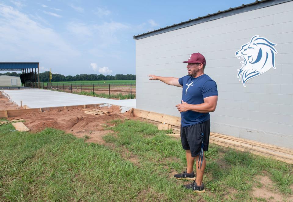 Head coach Chris Lyle talks about upgrades being made to the baseball field at L.E.A.D. Academy in Pace on Monday, July 11, 2022.