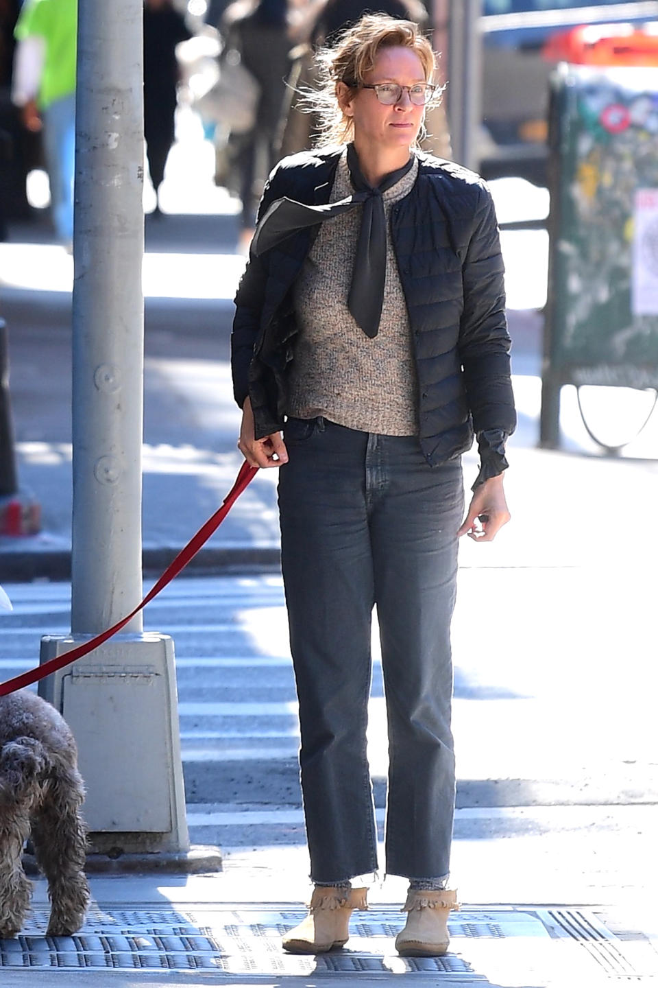 <p>Uma Thurman took her dog for a walk in New York City.</p>