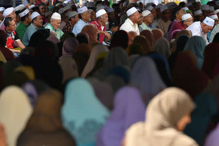 Men and women attend a 'ceramah' or religous lecture in Kota Bharu, Kelantan, Malaysia April 13, 2018. REUTERS/Stringer