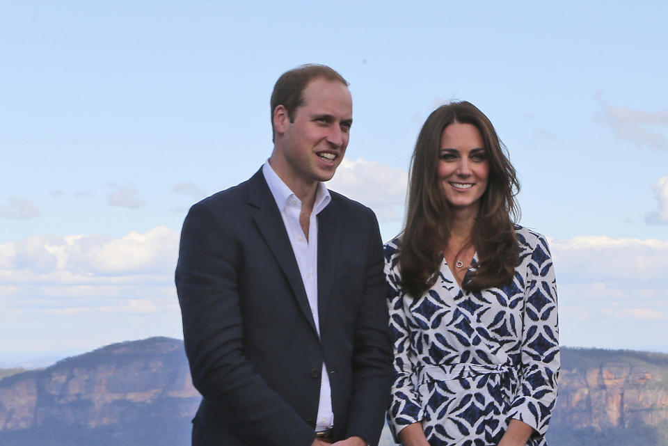 Britain's Prince William and his wife Kate, the Duchess of Cambridge pose for a photo at Echo Point Lookout in Katoomba, Australia, Thursday, April 17, 2014. The Duke and Duchess of Cambridge on Thursday stopped in the Blue Mountains town of Winmalee to meet with firefighters and locals affected by last year's wildfires that destroyed more than 200 homes. (AP Photo/Rob Griffith)