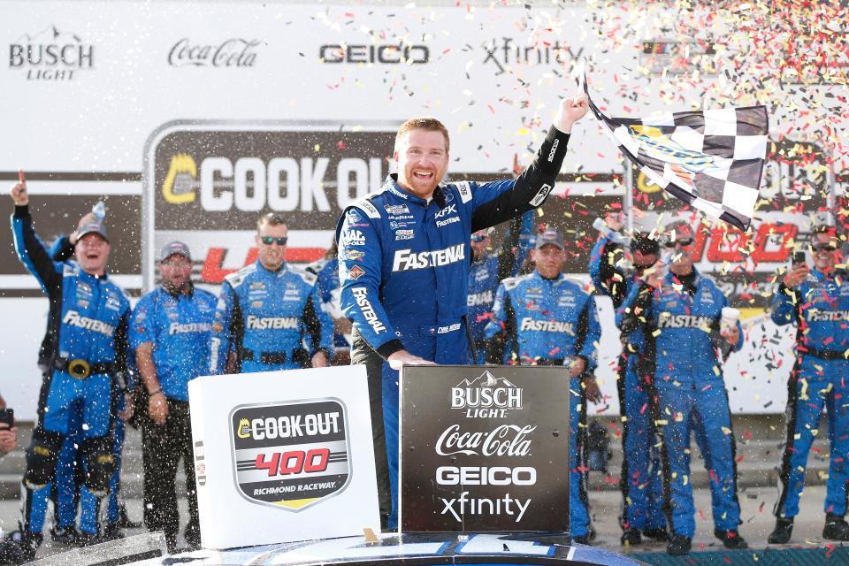 Chris Buescher celebrates in victory lane after winning Sunday's Cook Out 400 at Richmond Raceway.
