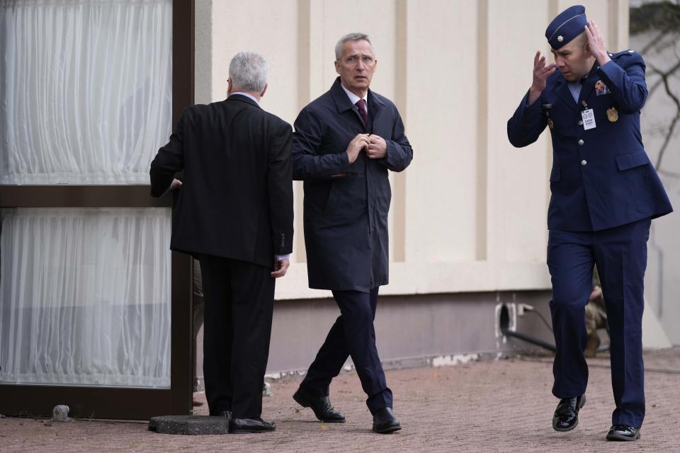 NATO Secretary General Jens Stoltenberg, left, arrives for a press statement prior to the meeting of the 'Ukraine Defense Contact Group' at Ramstein Air Base in Ramstein, Germany, Friday, April 21, 2023. The U.S. will begin training Ukrainian forces on how to use and maintain Abrams tanks in the coming weeks, as the U.S. continues to speed up its effort to get them onto the battlefield as quickly as possible, U.S. officials said Friday. (AP Photo/Matthias Schrader)