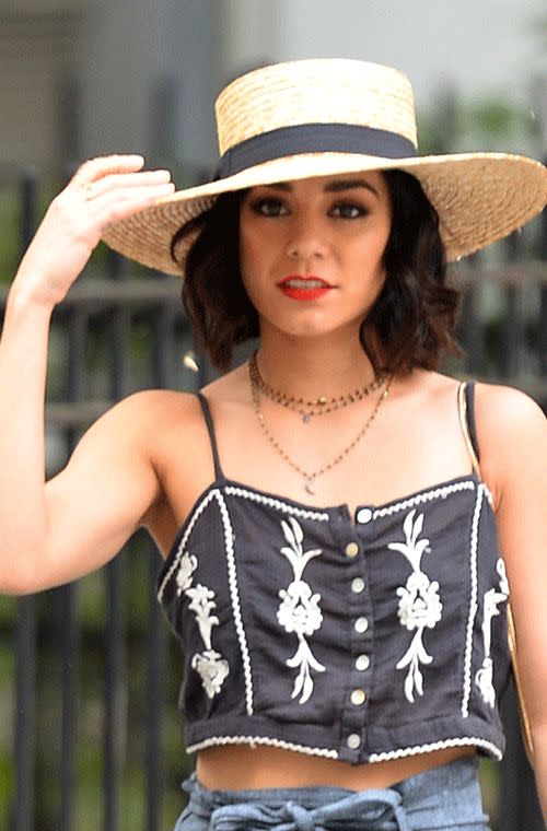 Hudgens was spotted with a bright red lip walking down the streets of Soho in New York. Her eyes pop dolled in all that bold black liner and mascara and are accentuated by her stylish, straightener-curled lob under that very lady-like hat.