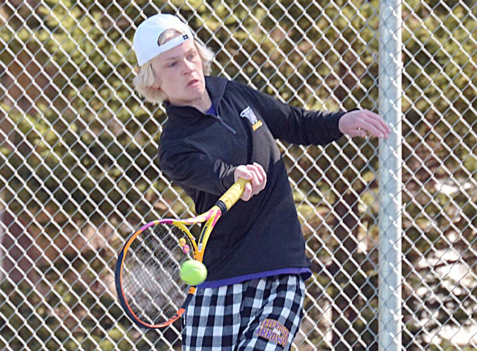 Watertown's Joey Meester hits a forehand return during a high school boys tennis triangular on Monday, April 17, 2023 at the Highland Park Tennis Courts in Watertown.