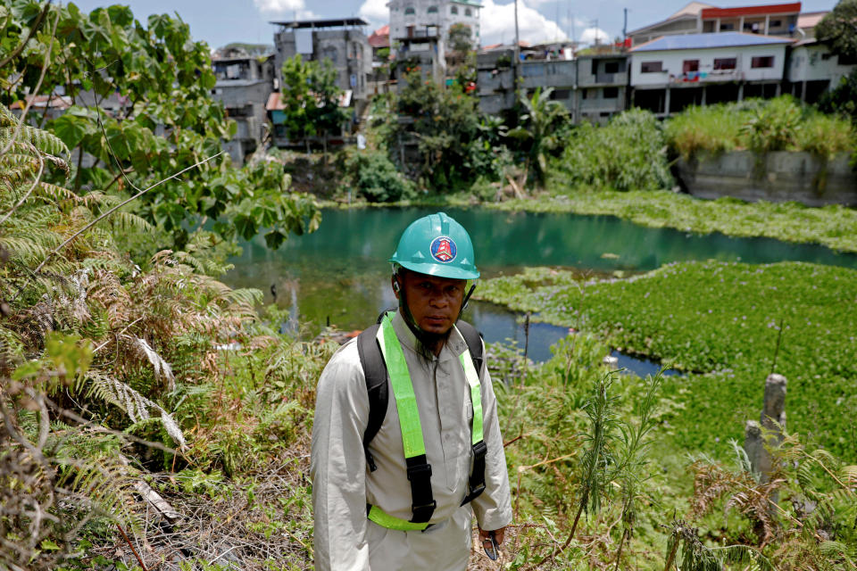 Mohammad Ali Acampong, 42, poses at the land where his house stood before the war, during a scheduled visit for displaced people at the most affected area of Marawi City, Lanao del Sur province, Philippines. (Photo: Eloisa Lopez/Reuters)