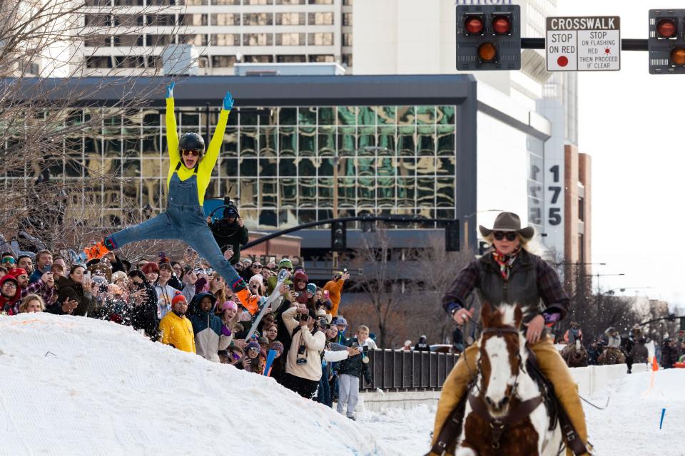 Kate Serpe skis behind Leanna Francis in a skijoring event, part of the Salt Lake Winter Roundup, on West Temple in downtown Salt Lake City on Saturday, Feb. 10, 2024. | Megan Nielsen, Deseret News